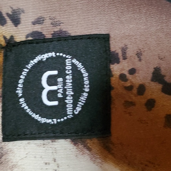 Maxime Paris made dress. Multi colored with attractive sleeves and hem. - Picture 5 of 8